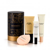 Cofre DD Cream Tono Medio + Contorno de Ojos Lifting Iluminador + radiant + esponja de maquillaje